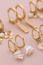 Oorringen met witte schelpen - My Jewellery